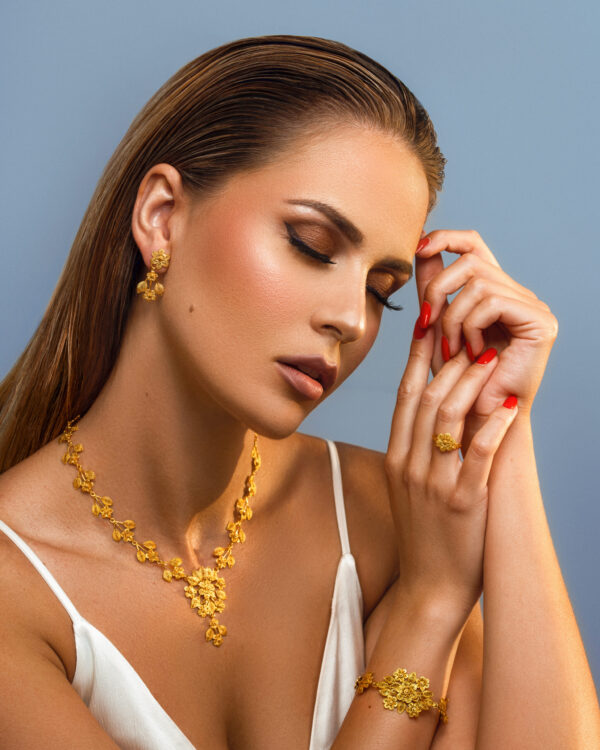 Filigree set worn by a model