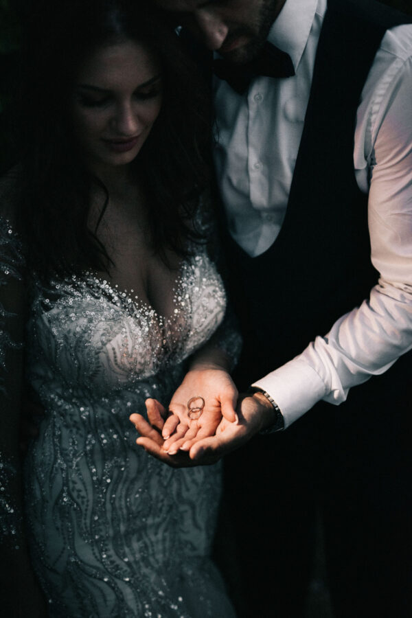Couple wearing wedding rings